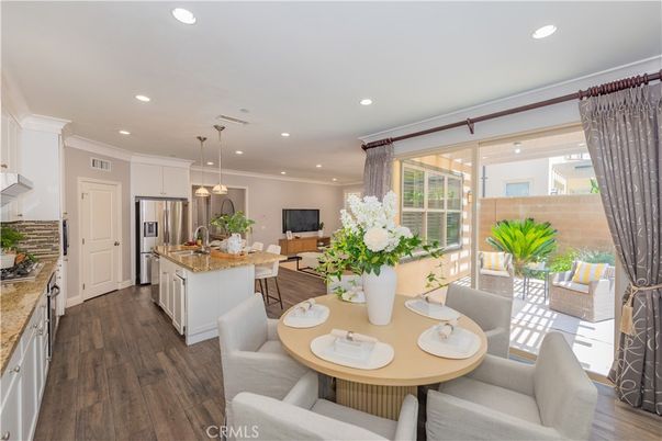 Dining room, Interior, Kitchen, Pendant Lights, Recessed Lighting, Stainless Steel Appliances, Wood Texture Flooring