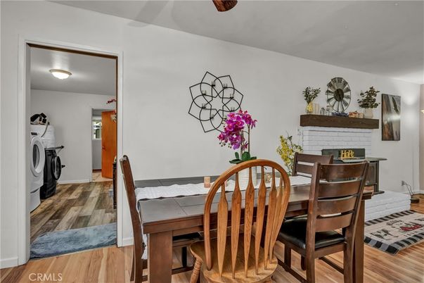 Dining room, Fireplace, Interior, Washer, Wood Texture Flooring
