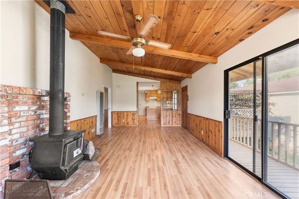 Empty room, Fireplace, Interior, Pendant Lights, Wooden Beams, Wooden Ceilings, Wood Texture Flooring