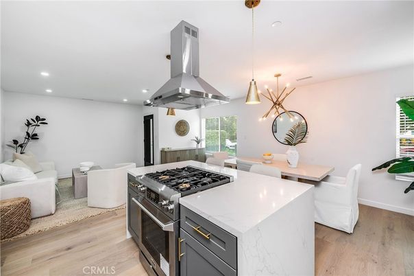 Dining room, Interior, Kitchen, Living room, Pendant Lights, Recessed Lighting, Stainless Steel Appliances, Wood Texture Flooring
