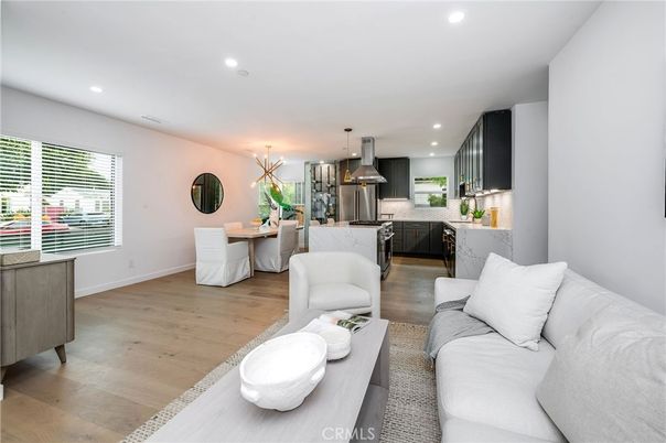 Dining room, Interior, Kitchen, Living room, Pendant Lights, Recessed Lighting, Stainless Steel Appliances, Wood Texture Flooring