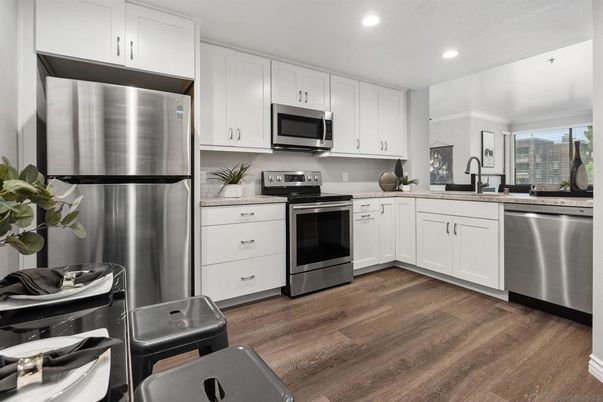 Interior, Kitchen, Recessed Lighting, Stainless Steel Appliances, Wood Texture Flooring