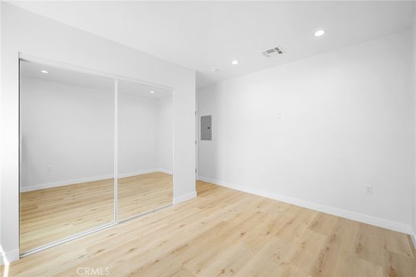 Elevator, Empty room, Interior, Recessed Lighting, Wood Texture Flooring