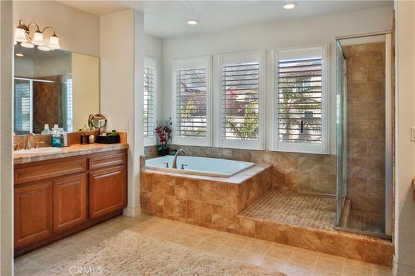 Bathroom, Dual Sink Vanities, Glass Shower, Interior, Recessed Lighting, Tile Countertops