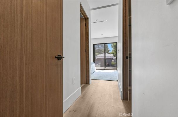 Interior, Kitchen, Marble Walls, Recessed Lighting, Stainless Steel Appliances, Wood Texture Flooring