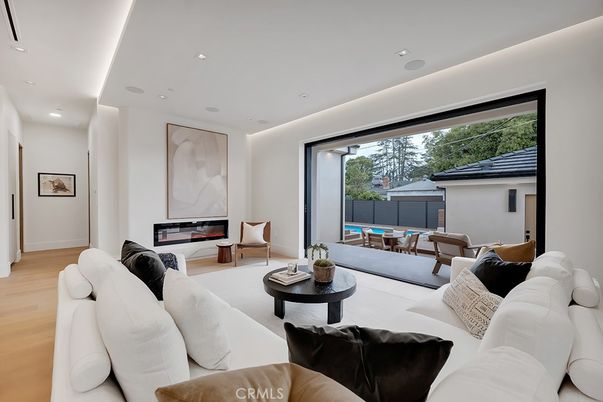 Dining room, Fireplace, Interior, Living room, Recessed Lighting, Wood Texture Flooring