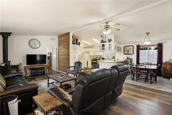 Dining room, Fireplace, Interior, Kitchen, Living room, Pendant Lights, Wood Texture Flooring