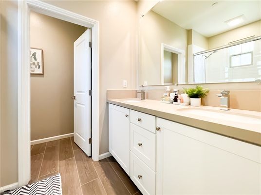 Bathroom, Dual Sink Vanities, Interior, Recessed Lighting, Wood Texture Flooring