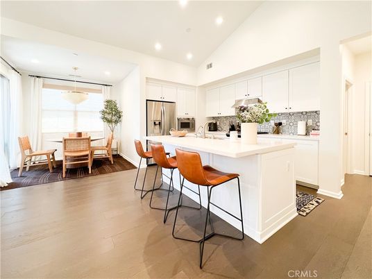 Dining room, Interior, Kitchen, Recessed Lighting, Stainless Steel Appliances, Wood Texture Flooring