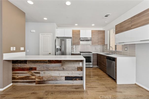 Interior, Kitchen, Recessed Lighting, Stainless Steel Appliances, Wood Texture Flooring