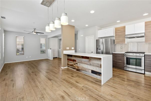 Interior, Kitchen, Pendant Lights, Recessed Lighting, Stainless Steel Appliances, Wood Texture Flooring