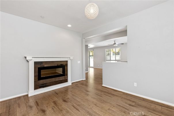 Empty room, Fireplace, Interior, Recessed Lighting, Wood Texture Flooring