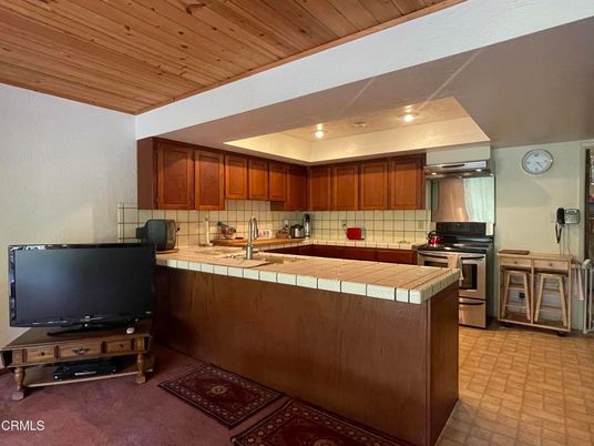 Interior, Kitchen, Recessed Lighting, Tile Countertops, Wooden Ceilings