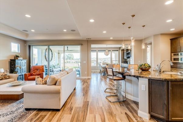 Dining room, Interior, Kitchen, Living room, Pendant Lights, Recessed Lighting, Stainless Steel Appliances, Wood Texture Flooring