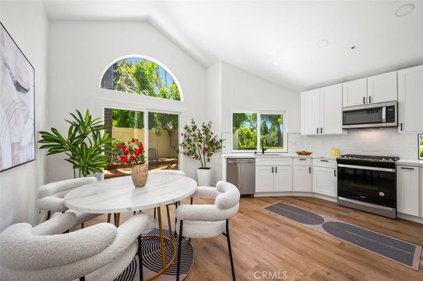 Dining room, Interior, Kitchen, Recessed Lighting, Stainless Steel Appliances, Wood Texture Flooring