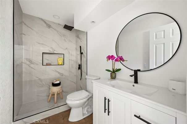 Bathroom, Glass Shower, Interior, Marble Walls, Wood Texture Flooring