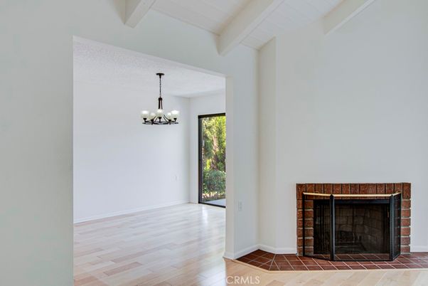 Chandelier, Empty room, Fireplace, Interior, Wood Texture Flooring