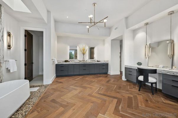Bathroom, Dual Sink Vanities, Free Standing Baths, Interior, Pendant Lights, Recessed Lighting, Wood Texture Flooring