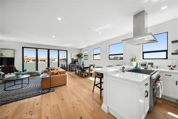 Dining room, Interior, Kitchen, Living room, Recessed Lighting, Water, Wood Texture Flooring