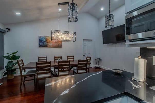 Dining room, Interior, Pendant Lights, Recessed Lighting, Stainless Steel Appliances, Wood Texture Flooring