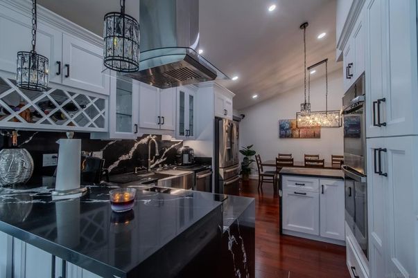 Dining room, Interior, Kitchen, Pendant Lights, Recessed Lighting, Stainless Steel Appliances, Wood Texture Flooring