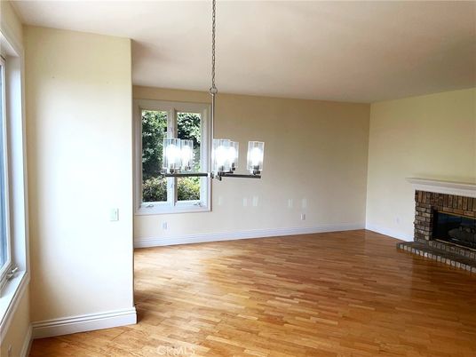 Empty room, Fireplace, Interior, Pendant Lights, Wood Texture Flooring