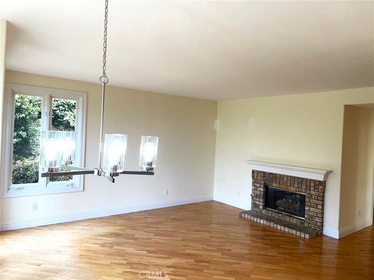 Empty room, Fireplace, Interior, Pendant Lights, Wood Texture Flooring