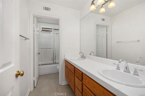 Bathroom, Dual Sink Vanities, Glass Shower, Interior, Tile Countertops