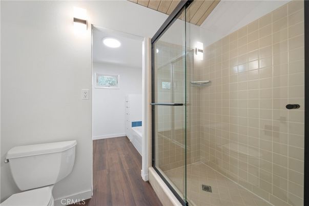 Bathroom, Glass Shower, Interior, Recessed Lighting, Wood Texture Flooring