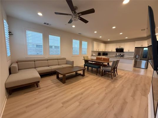 Dining room, Interior, Kitchen, Living room, Recessed Lighting, Stainless Steel Appliances, Wood Texture Flooring