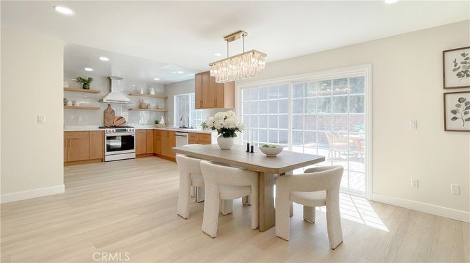 Chandelier, Dining room, Interior, Kitchen, Recessed Lighting, Stainless Steel Appliances, Wood Texture Flooring