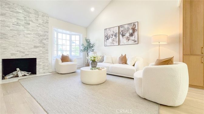 Fireplace, Interior, Living room, Recessed Lighting, Stone Walls, Wood Texture Flooring