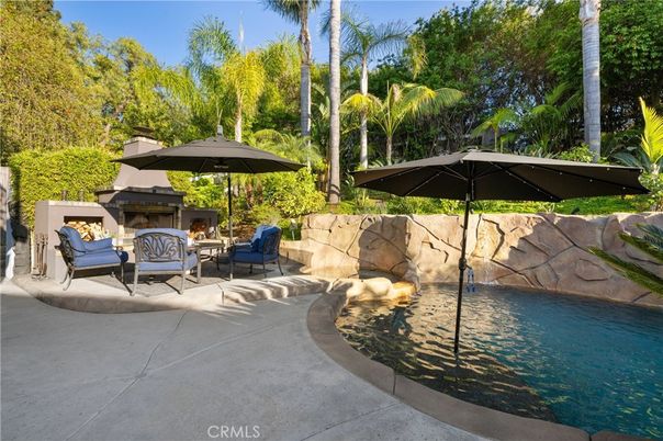 Exterior, Fireplace, Pool