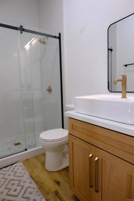 Bathroom, Glass Shower, Interior, Wood Texture Flooring