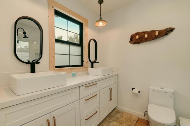 Bathroom, Dual Sink Vanities, Interior, Pendant Lights, Wood Texture Flooring