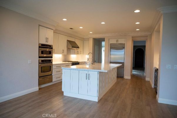 Interior, Kitchen, Recessed Lighting, Stainless Steel Appliances, Washer, Wood Texture Flooring