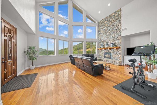 Fireplace, Fitness Equipment, Interior, Recessed Lighting, Stone Walls, Wood Texture Flooring