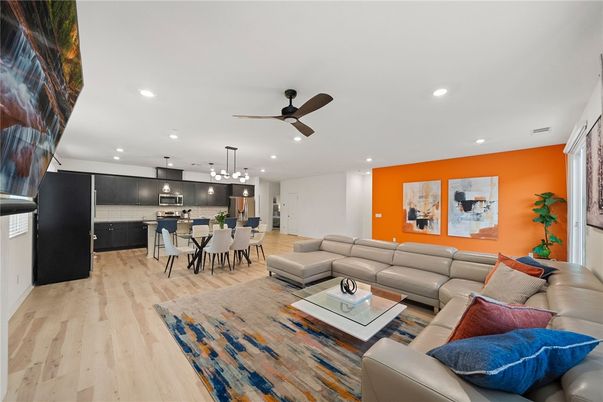 Dining room, Interior, Kitchen, Living room, Pendant Lights, Recessed Lighting, Stainless Steel Appliances, Wood Texture Flooring