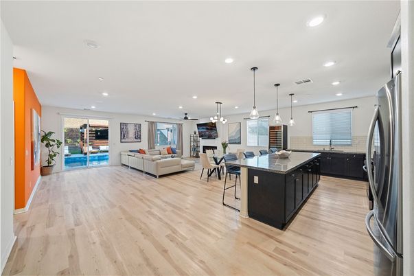 Dining room, Interior, Kitchen, Living room, Pendant Lights, Recessed Lighting, Stainless Steel Appliances, Wood Texture Flooring