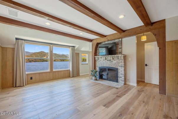 Empty room, Fireplace, Interior, Recessed Lighting, Wooden Beams, Wood Texture Flooring