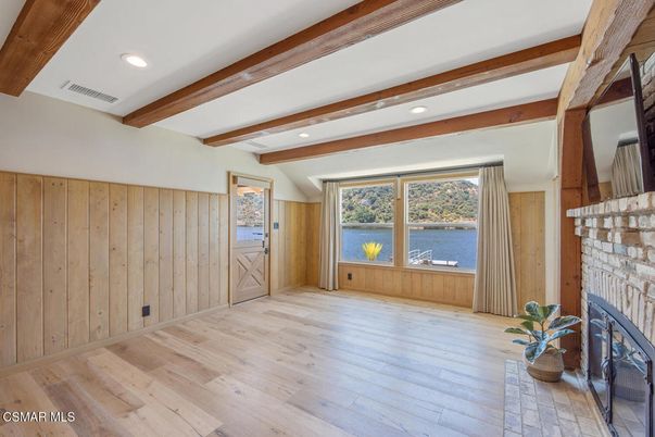 Empty room, Fireplace, Interior, Recessed Lighting, Water, Wooden Beams, Wood Texture Flooring, Wooden Walls
