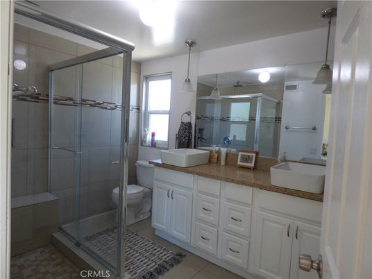 Bathroom, Dual Sink Vanities, Glass Shower, Interior, Pendant Lights