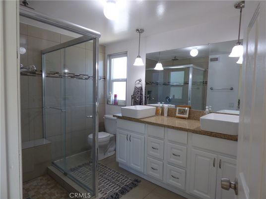 Bathroom, Dual Sink Vanities, Glass Shower, Interior, Pendant Lights