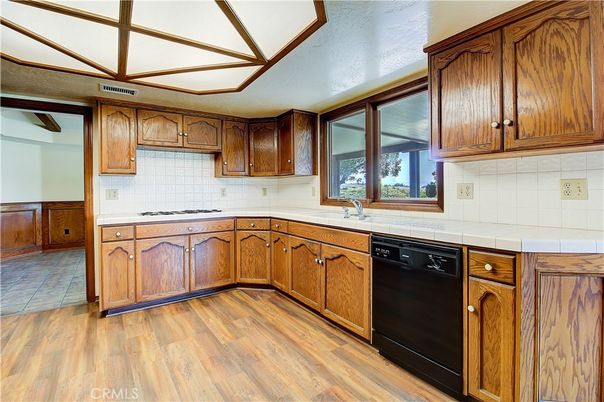 Interior, Kitchen, Tile Countertops, Wood Texture Flooring