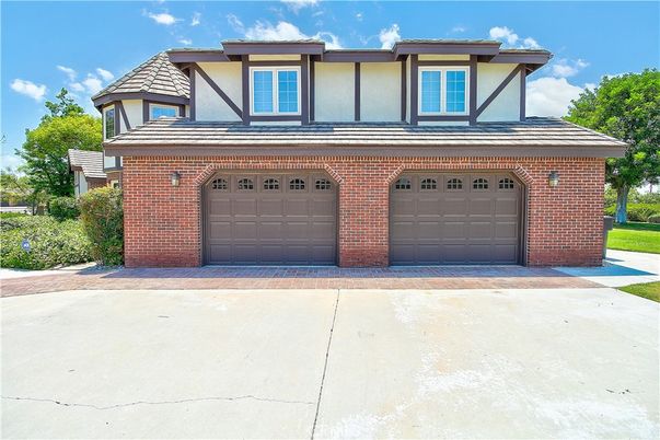 Attached, Exterior, Facade, Brick Facade, Tudor Revival