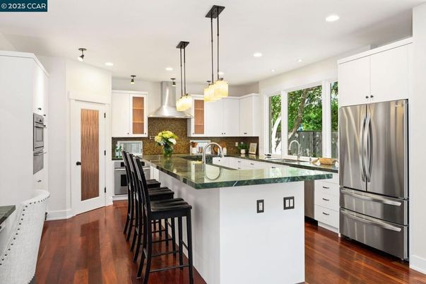 Interior, Kitchen, Pendant Lights, Recessed Lighting, Stainless Steel Appliances, Wood Texture Flooring