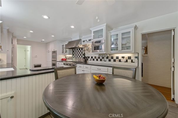 Dining room, Interior, Kitchen, Recessed Lighting, Stainless Steel Appliances, Wood Texture Flooring