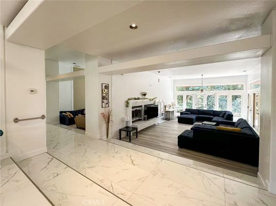 Fireplace, Interior, Living room, Marble, Recessed Lighting, Wood Texture Flooring