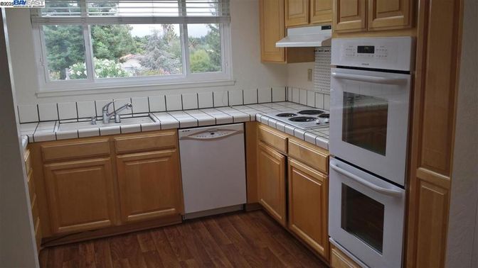 Interior, Kitchen, Tile Countertops, Wood Texture Flooring