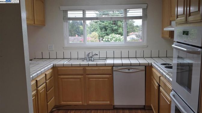 Interior, Kitchen, Tile Countertops, Wood Texture Flooring